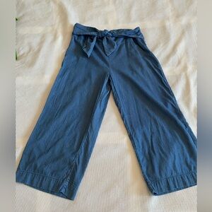 3 for 15$! Wide leg blue chambray trousers with bow front detail and side zip.